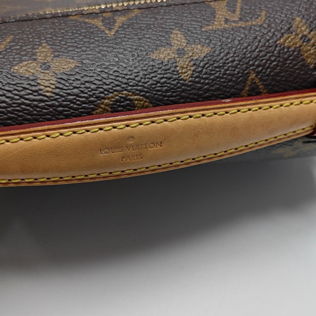 MÉTIS EAST WEST Monogram Coated Canvas Brown