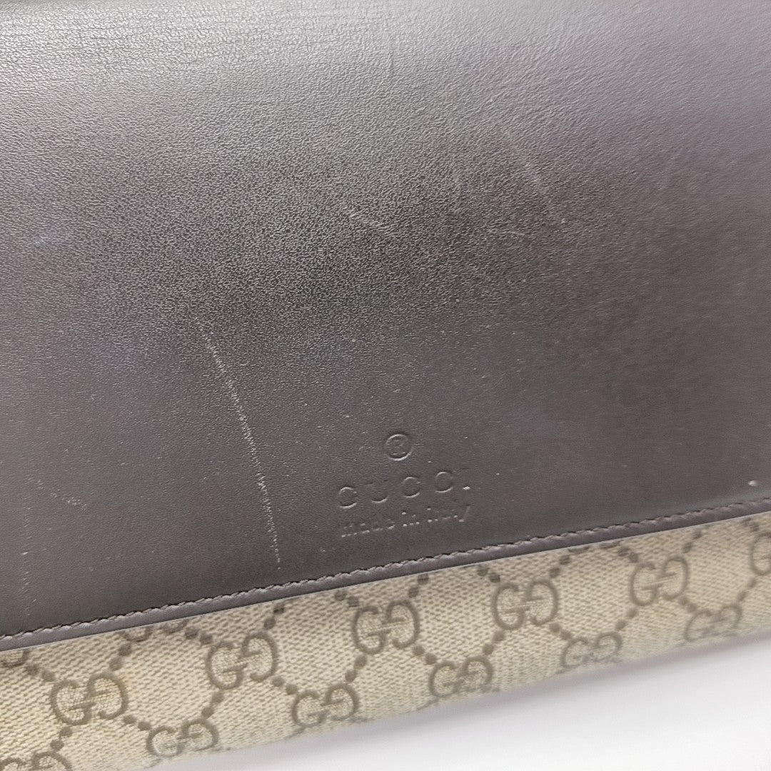 Monogram Coated Canvas Clutch Black