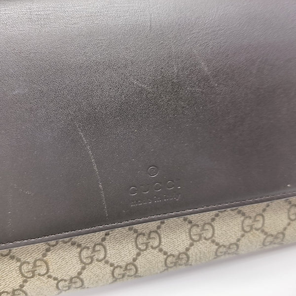 Monogram Coated Canvas Clutch Black