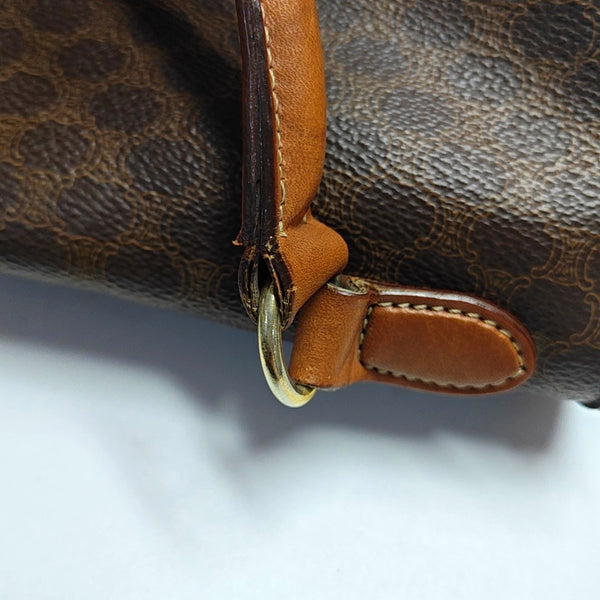 Authenticated pre-owned  MACADAM BLASON TRIOMPHE Coated Canvas Brown - Top Handle Bag at Looply