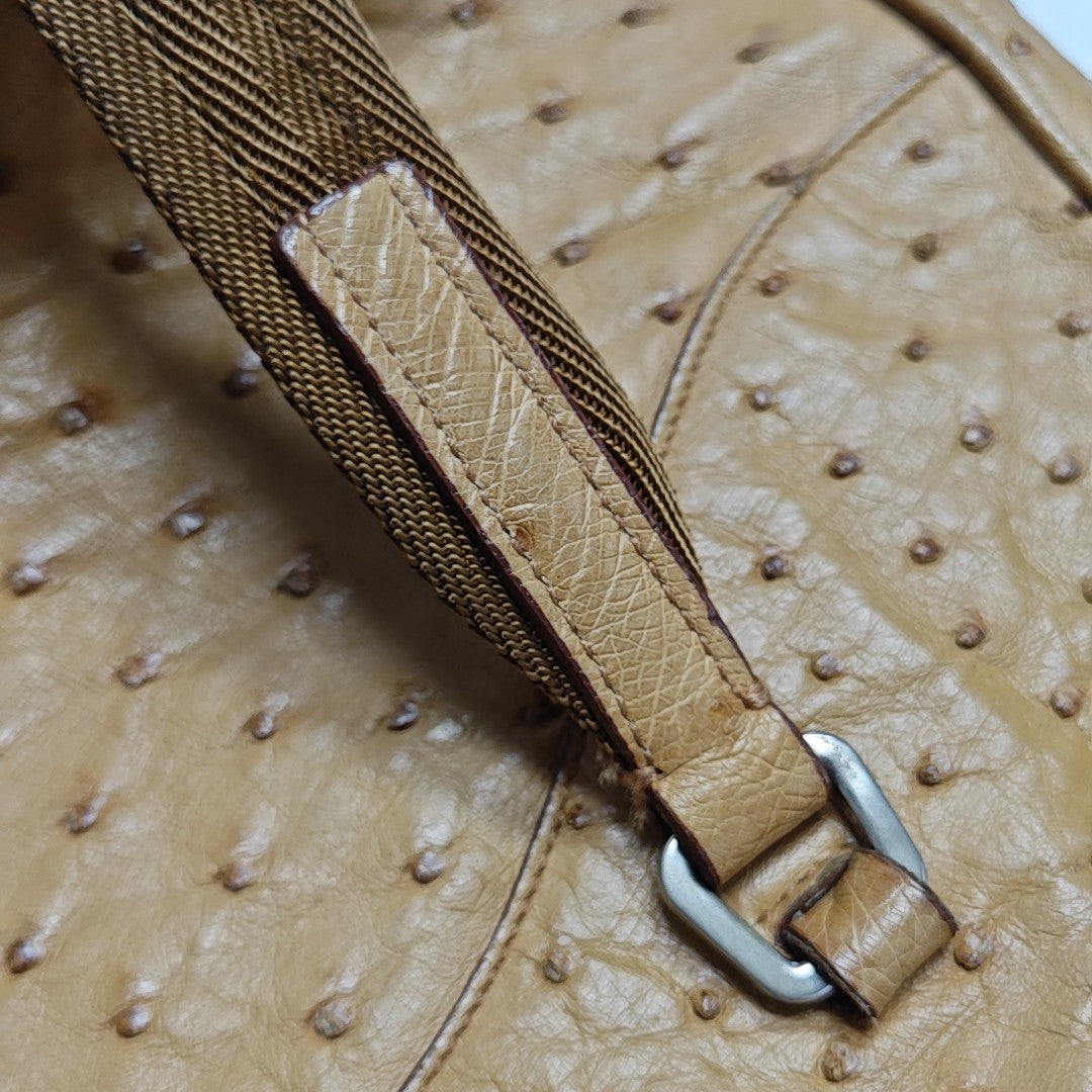 Bolso de mano de avestruz amarillo