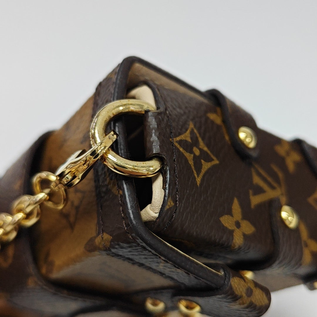 TRUNK Monogram Coated Canvas Brown