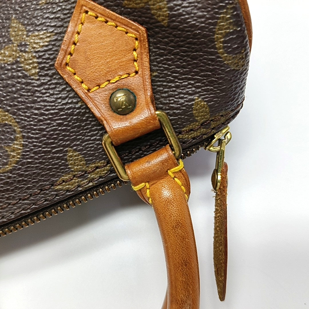 Authenticated pre-owned  SPEEDY Nano Monogram Coated Canvas Brown - Top Handle Bag at Looply