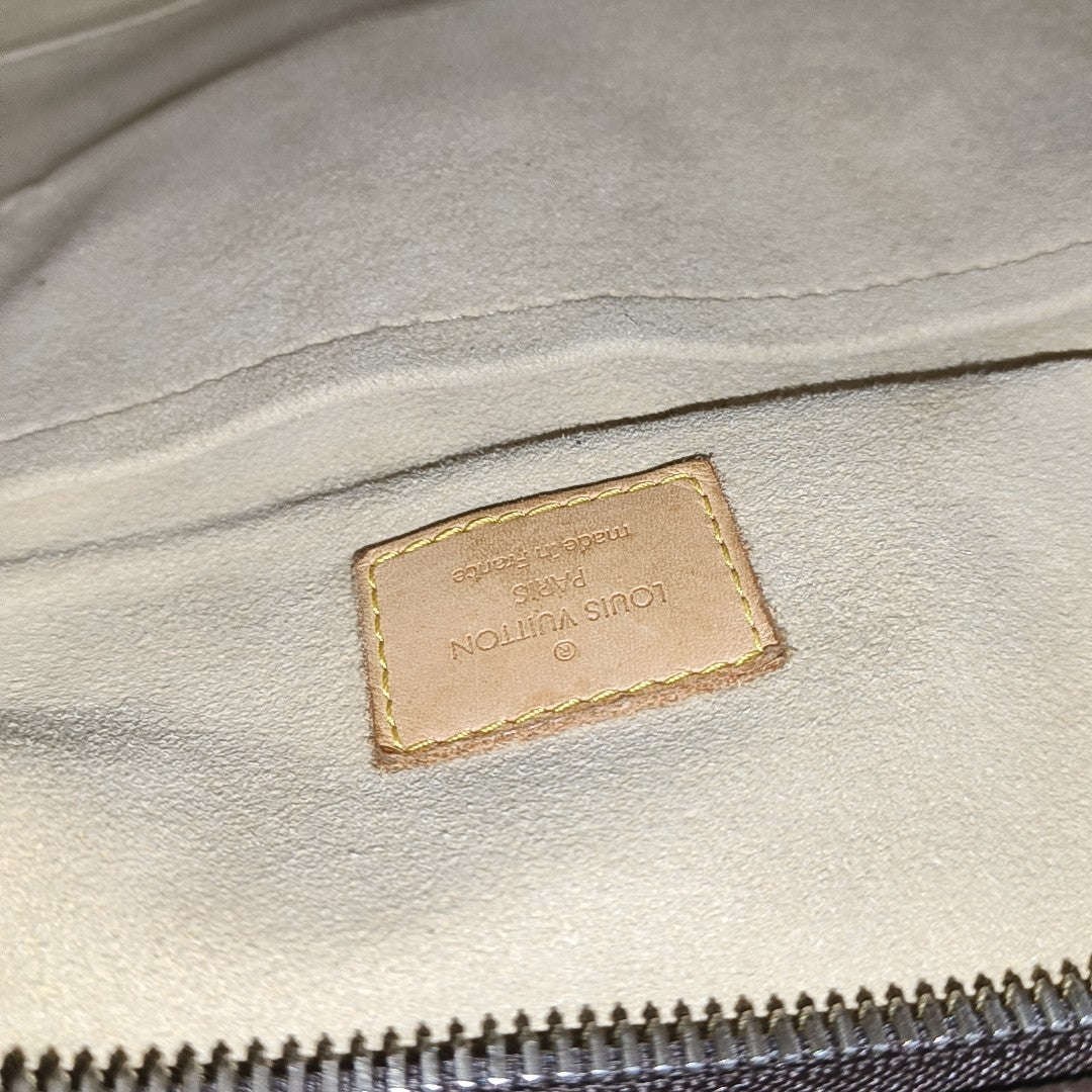 MANHATTAN GM Monogram Coated Canvas Brown