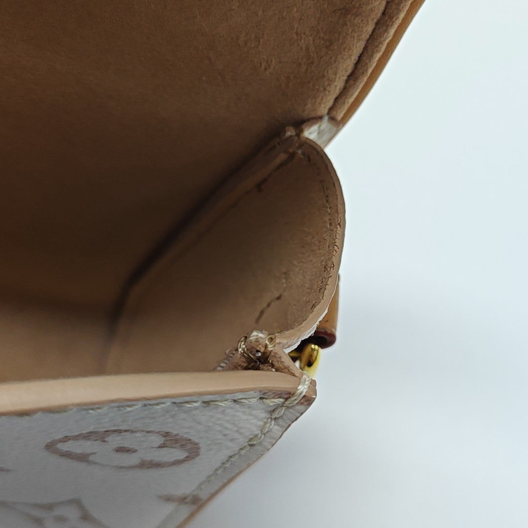 Pochette Camille Monogram Coated Canvas Beige