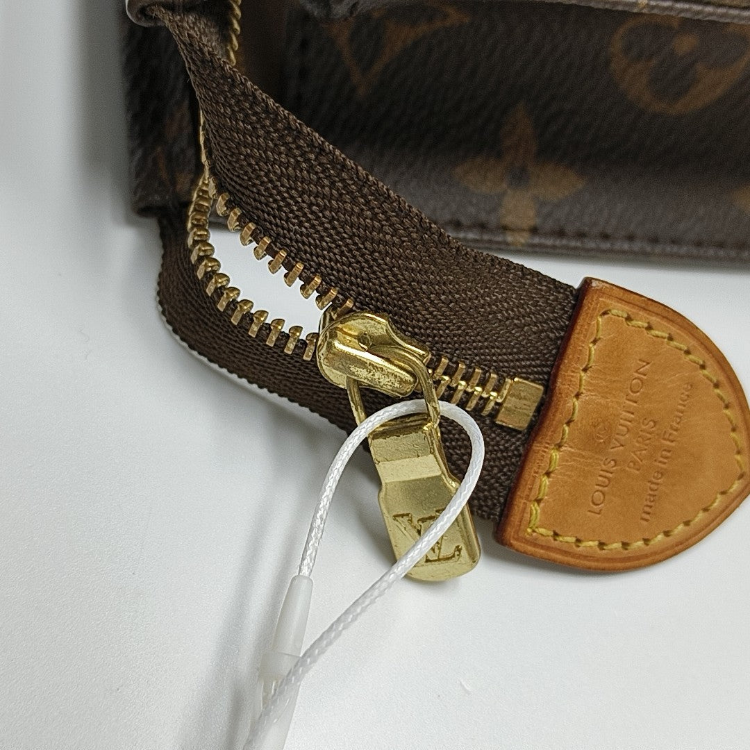 TOILET POCKET 26 Monogram Coated Canvas Brown