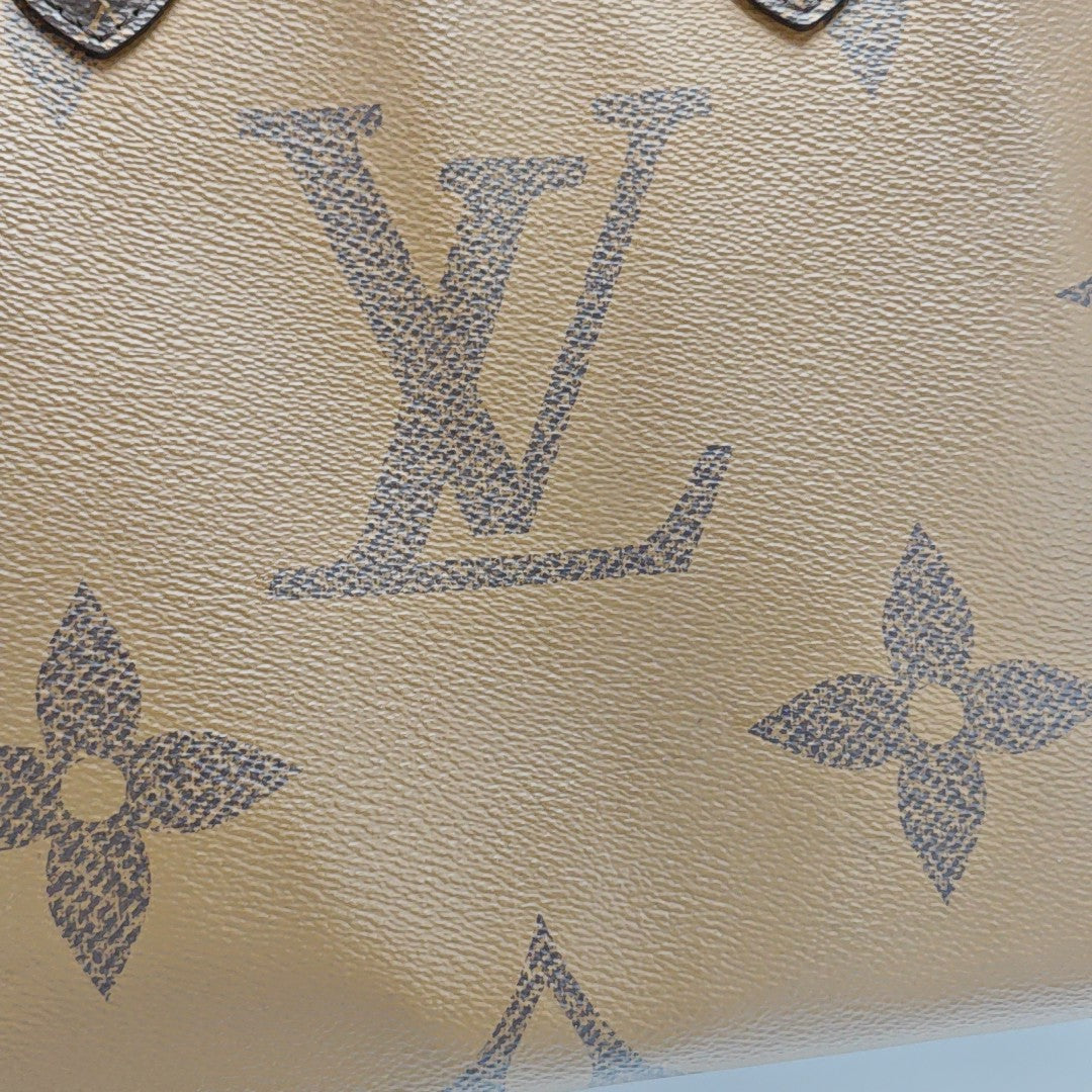 ONTHEGO MM Monogram Coated Canvas Brown