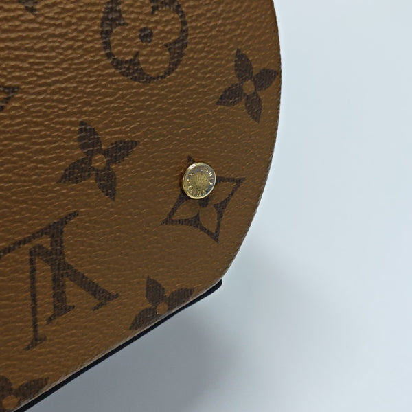CANNES PM Monogram Coated Canvas Brown