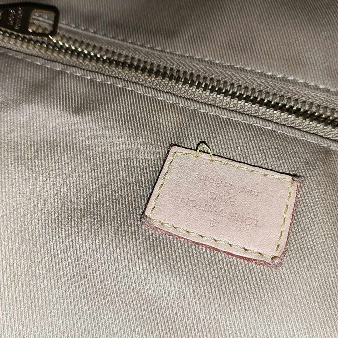 GRACEFUL TPM Monogram Coated Canvas Brown
