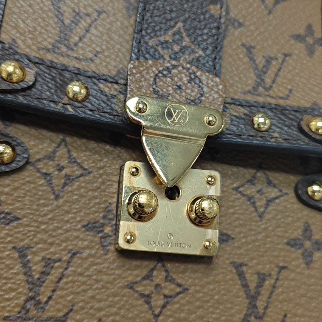 TRUNK Monogram Coated Canvas Brown