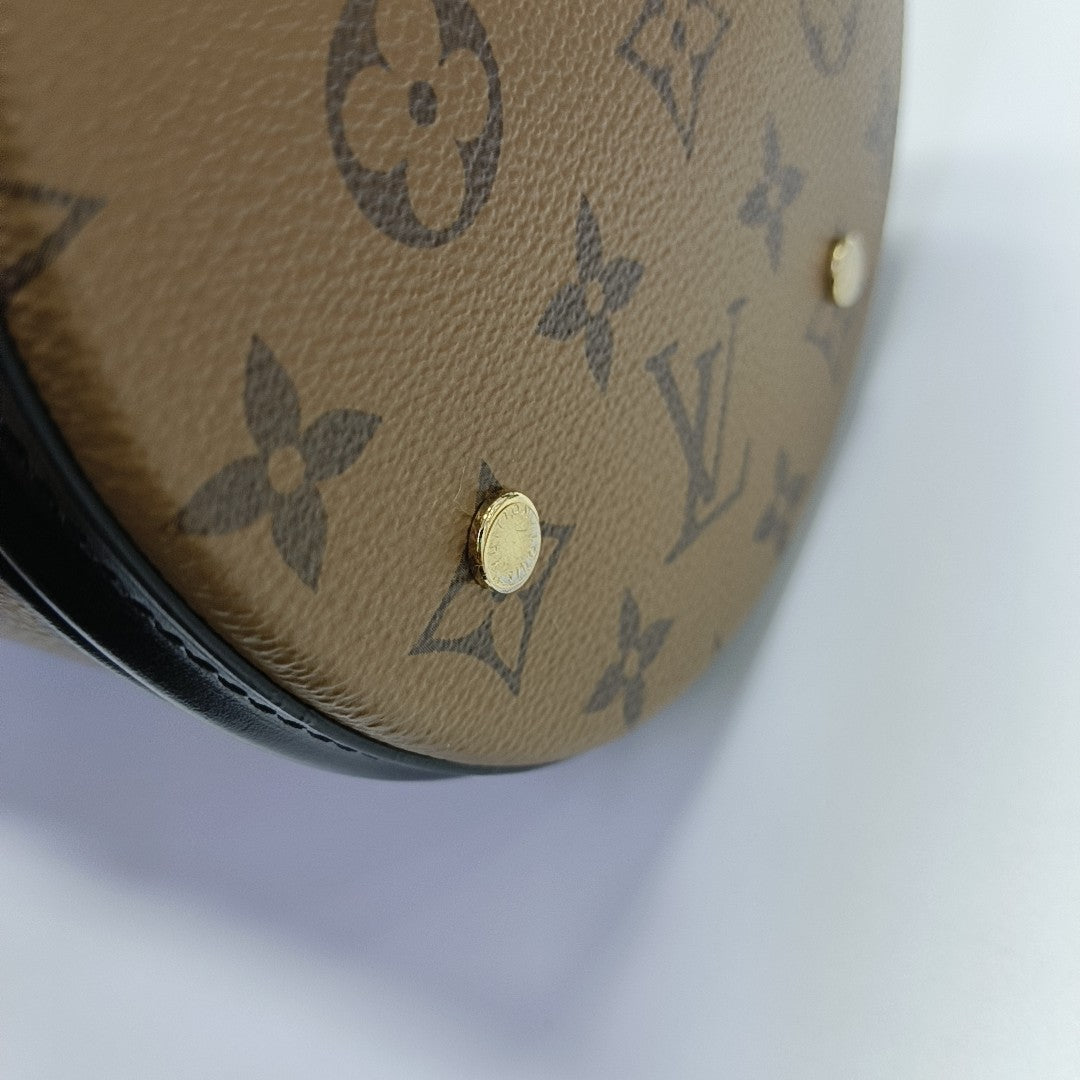 CANNES PM Monogram Coated Canvas Brown