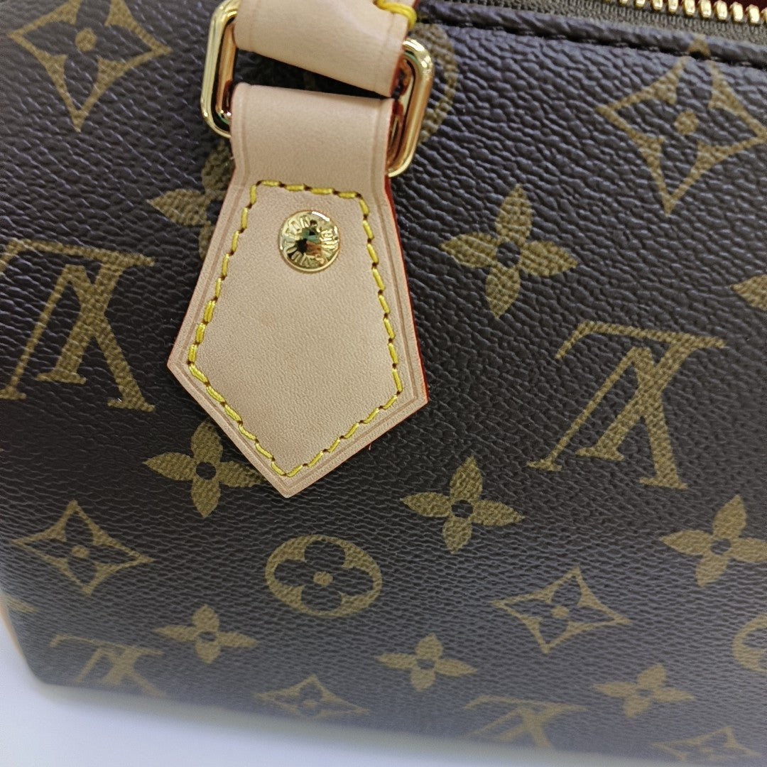 SPEEDY 20 Monogram Coated Canvas Brown