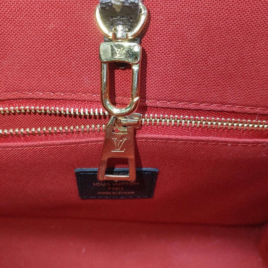 ONTHEGO PM Monogram Coated Canvas Brown