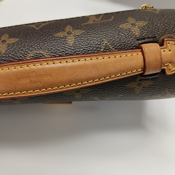MÉTIS EAST WEST Monogram Coated Canvas Brown