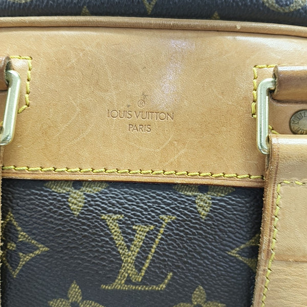 EXCURSION Monogram Coated Canvas Brown
