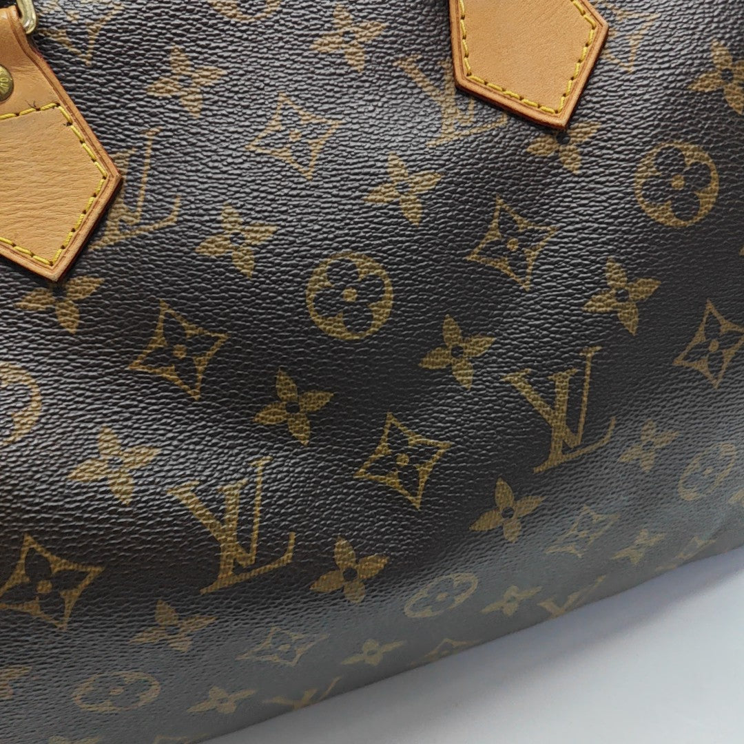 SPEEDY 30 Monogram Coated Canvas Brown