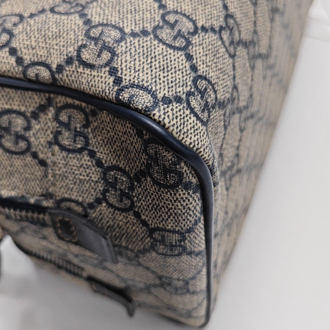 Monogram Coated Canvas Clutch Black