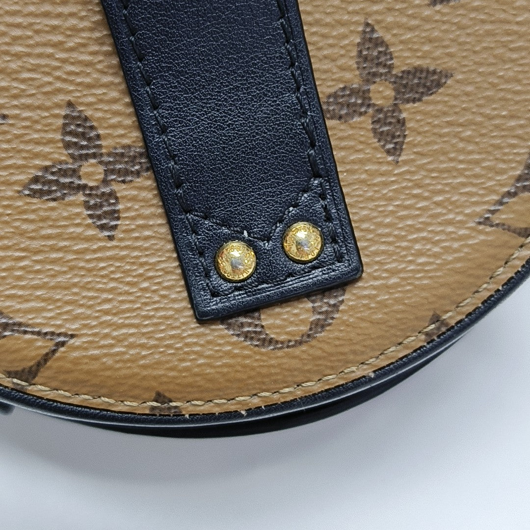 BOITE CHAPEAU Mini Monogram Coated Canvas Brown