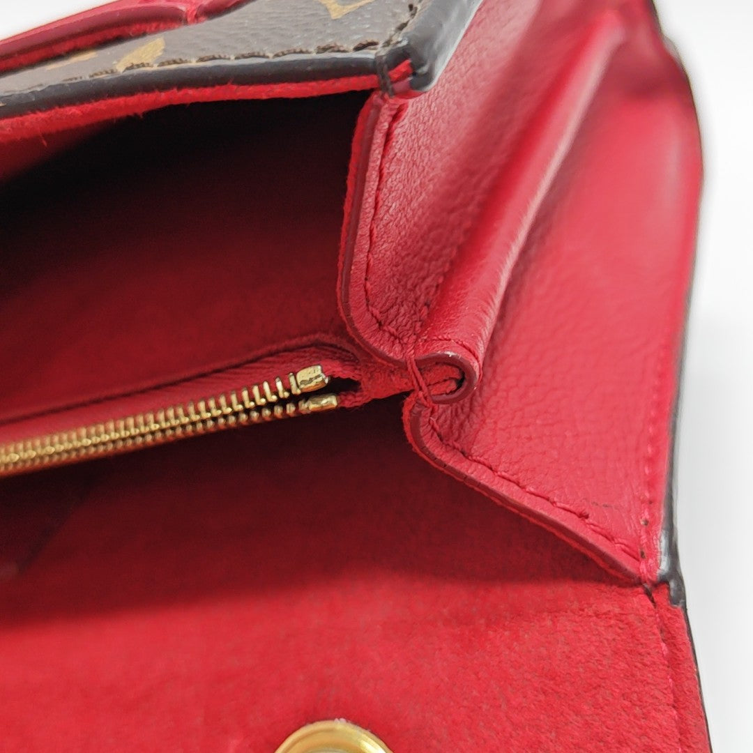 VICTOIRE Monogram Coated Canvas Brown
