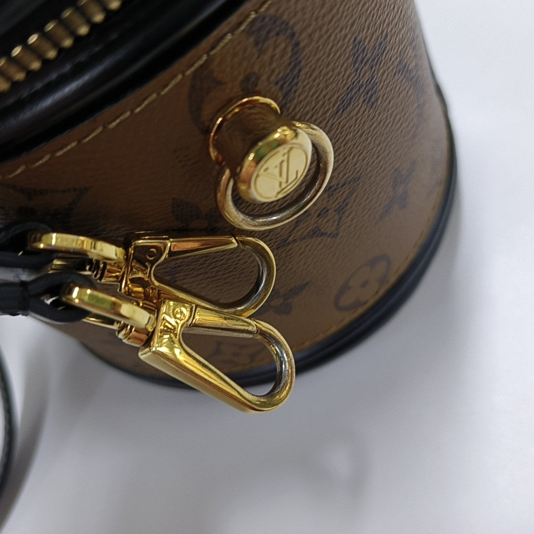 CANNES PM Monogram Coated Canvas Brown