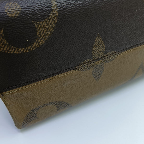 ONTHEGO MM Monogram Coated Canvas Brown