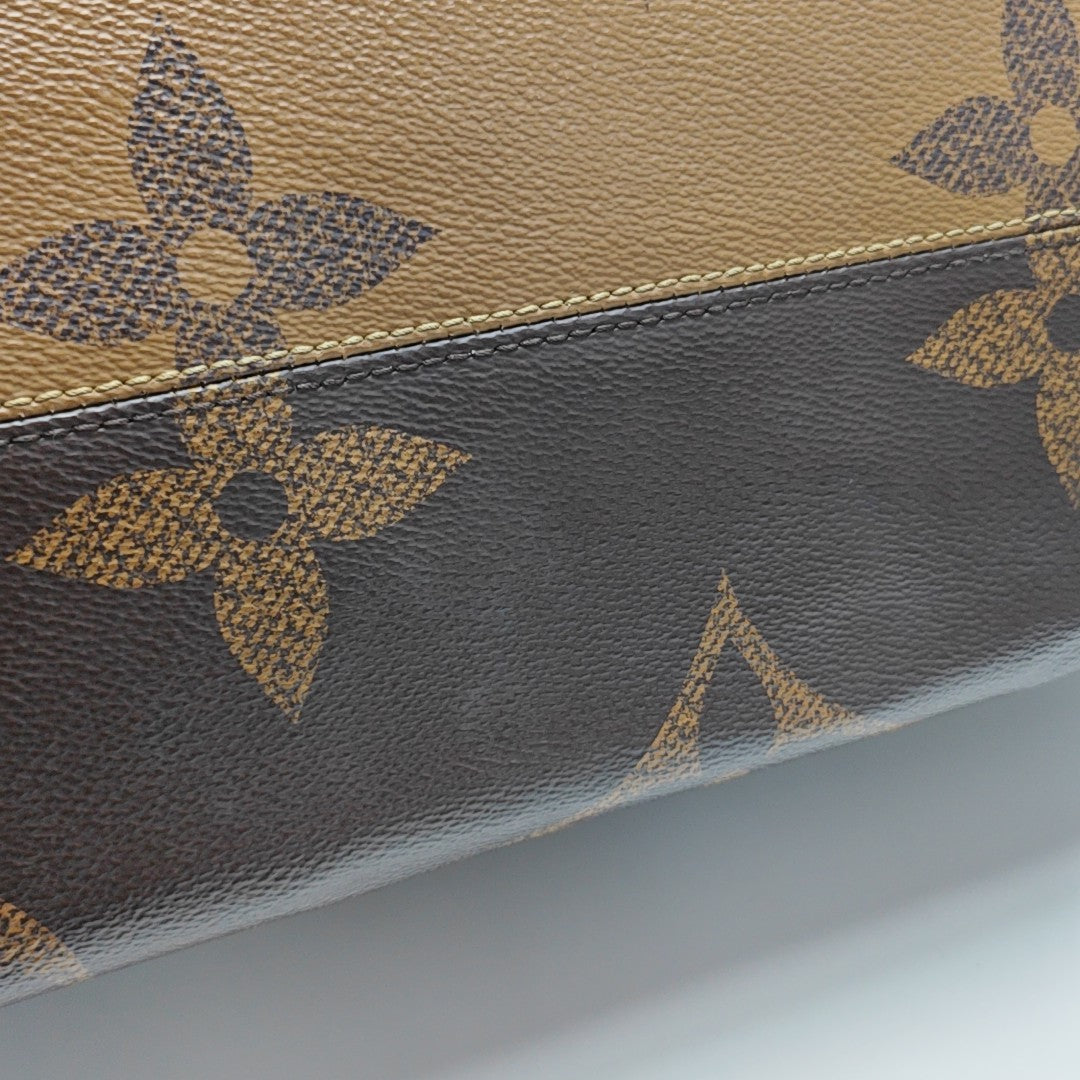 ONTHEGO GM Monogram Coated Canvas Brown