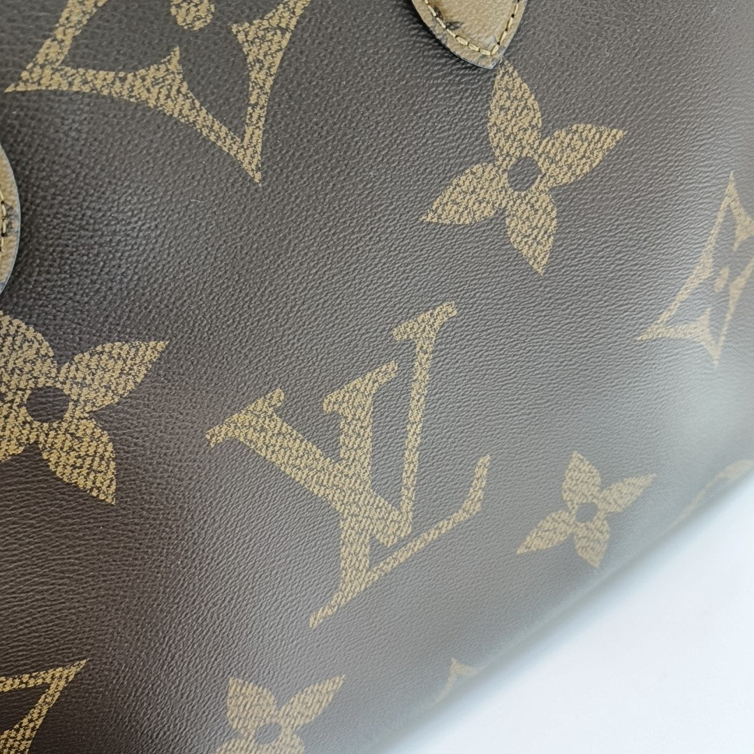 ONTHEGO GM Monogram Coated Canvas Brown
