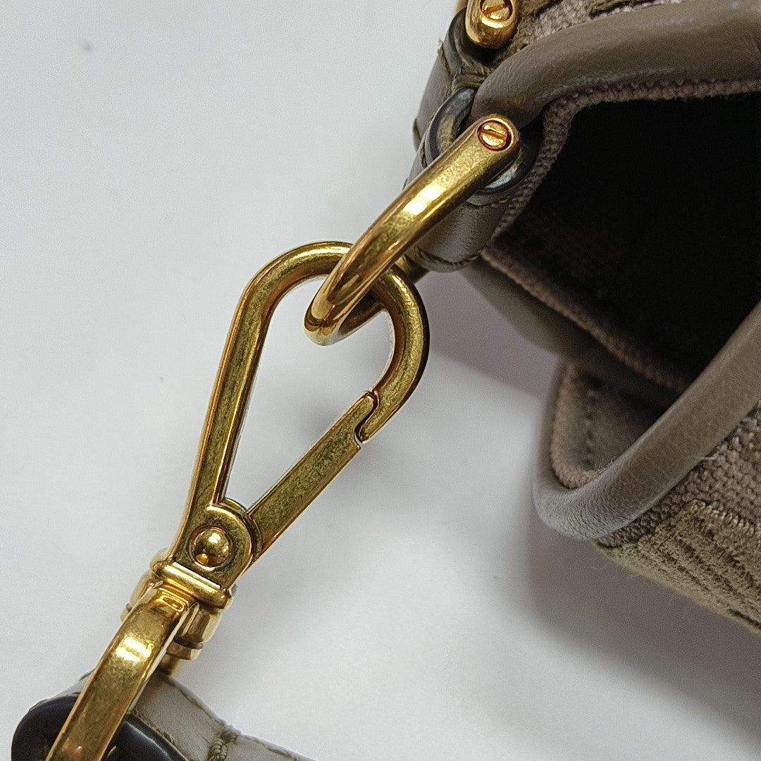 Authenticated pre-owned  Baguette Medium Fabric Brown - Shoulder Bag at Looply