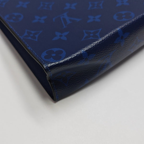 Pochette Voyag MM Monogram Coated Canvas Blue