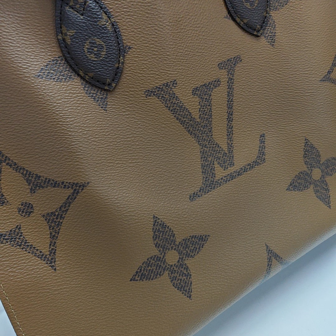 ONTHEGO MM Monogram Coated Canvas Brown