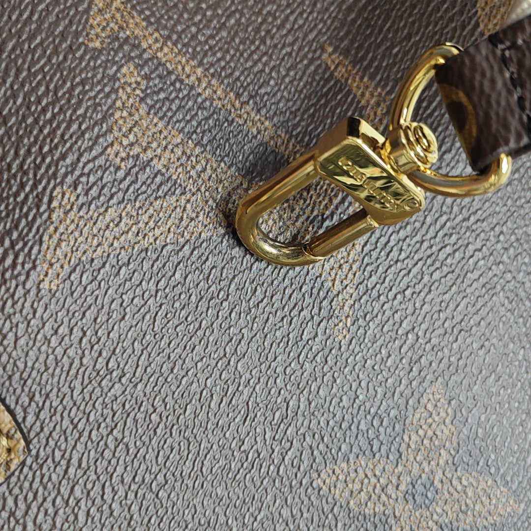 ONTHEGO PM Monogram Coated Canvas Brown