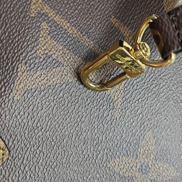 ONTHEGO PM Monogram Coated Canvas Brown