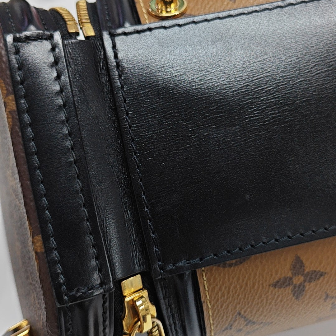 CANNES PM Monogram Coated Canvas Brown
