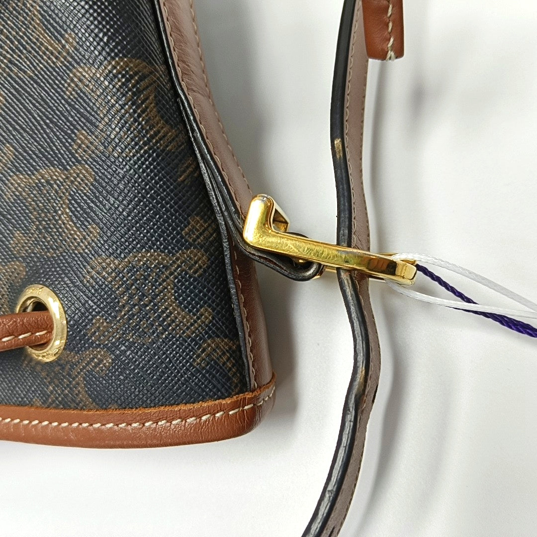 Authenticated pre-owned  TRIOMPHE CANVAS Small Coated Canvas Brown - Bucket Bag at Looply