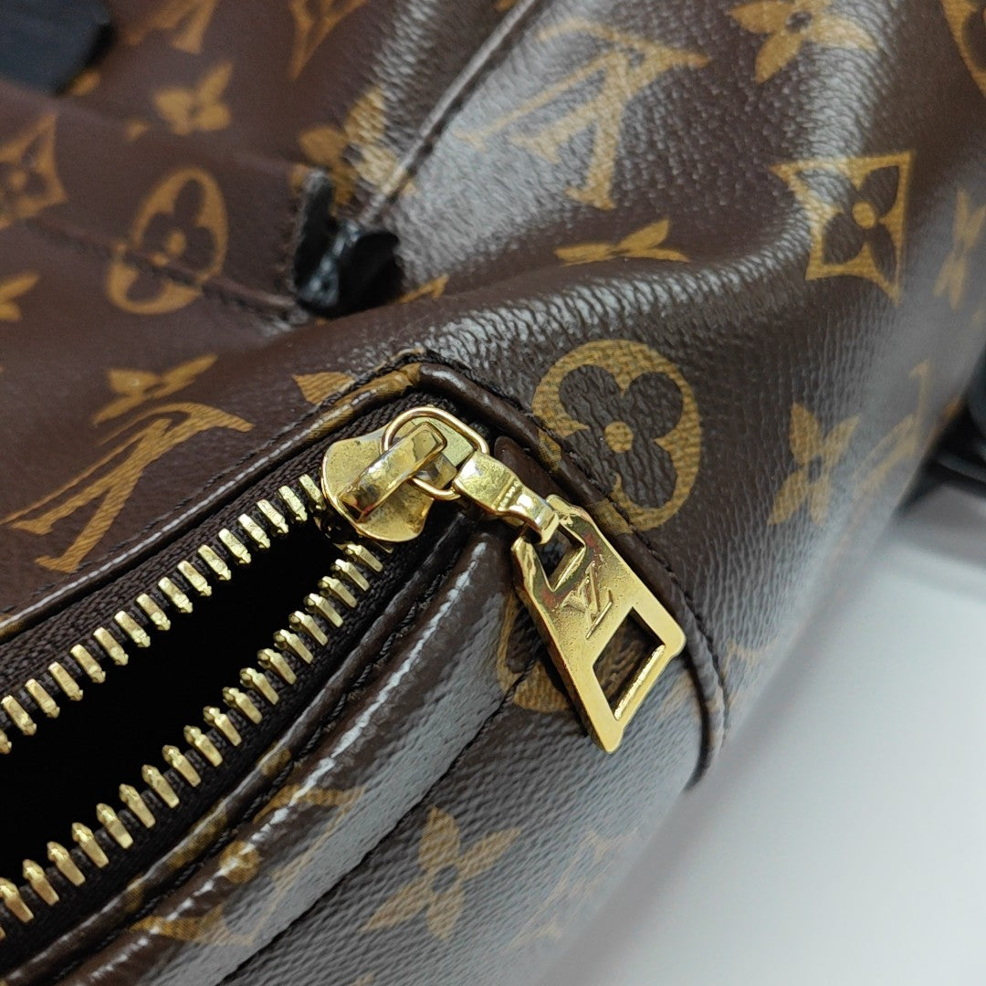Monogram Coated Canvas Backpack Brown