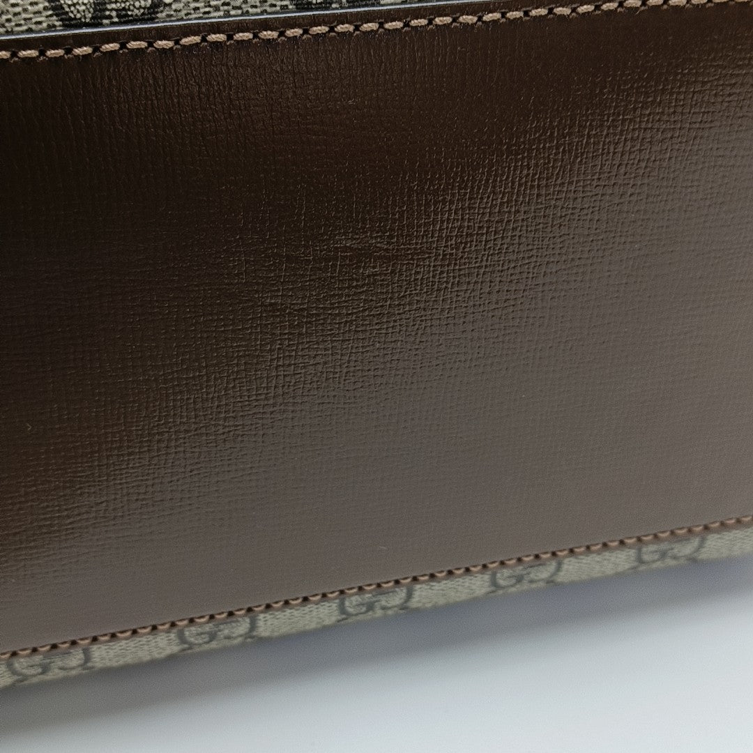 Retro Small Monogram Coated Canvas Brown