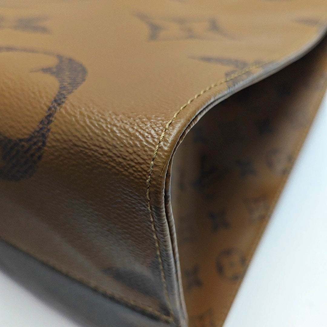 ONTHEGO GM Monogram Coated Canvas Brown