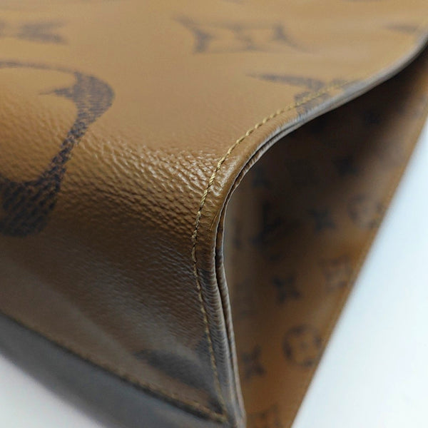 ONTHEGO GM Monogram Coated Canvas Brown