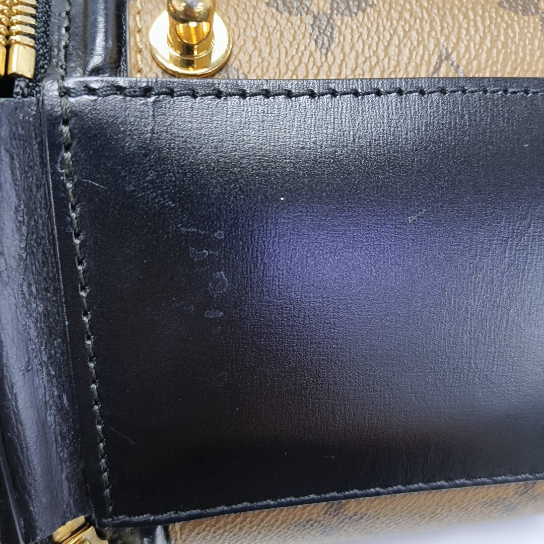 CANNES PM Monogram Coated Canvas Brown