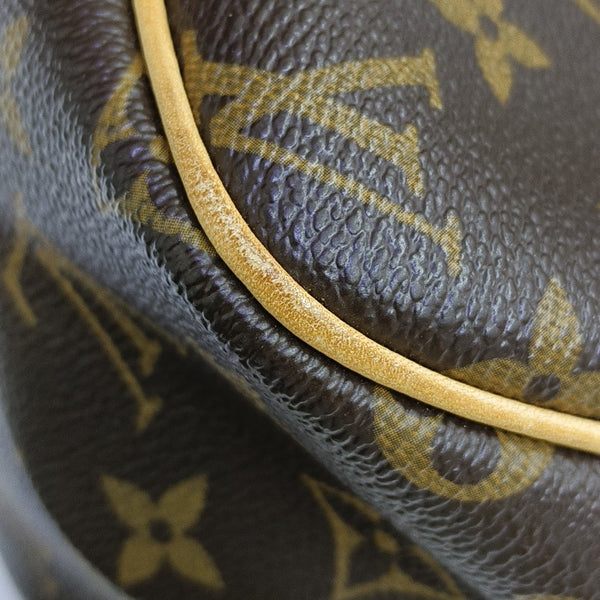 REPORTER PM Monogram Coated Canvas Brown