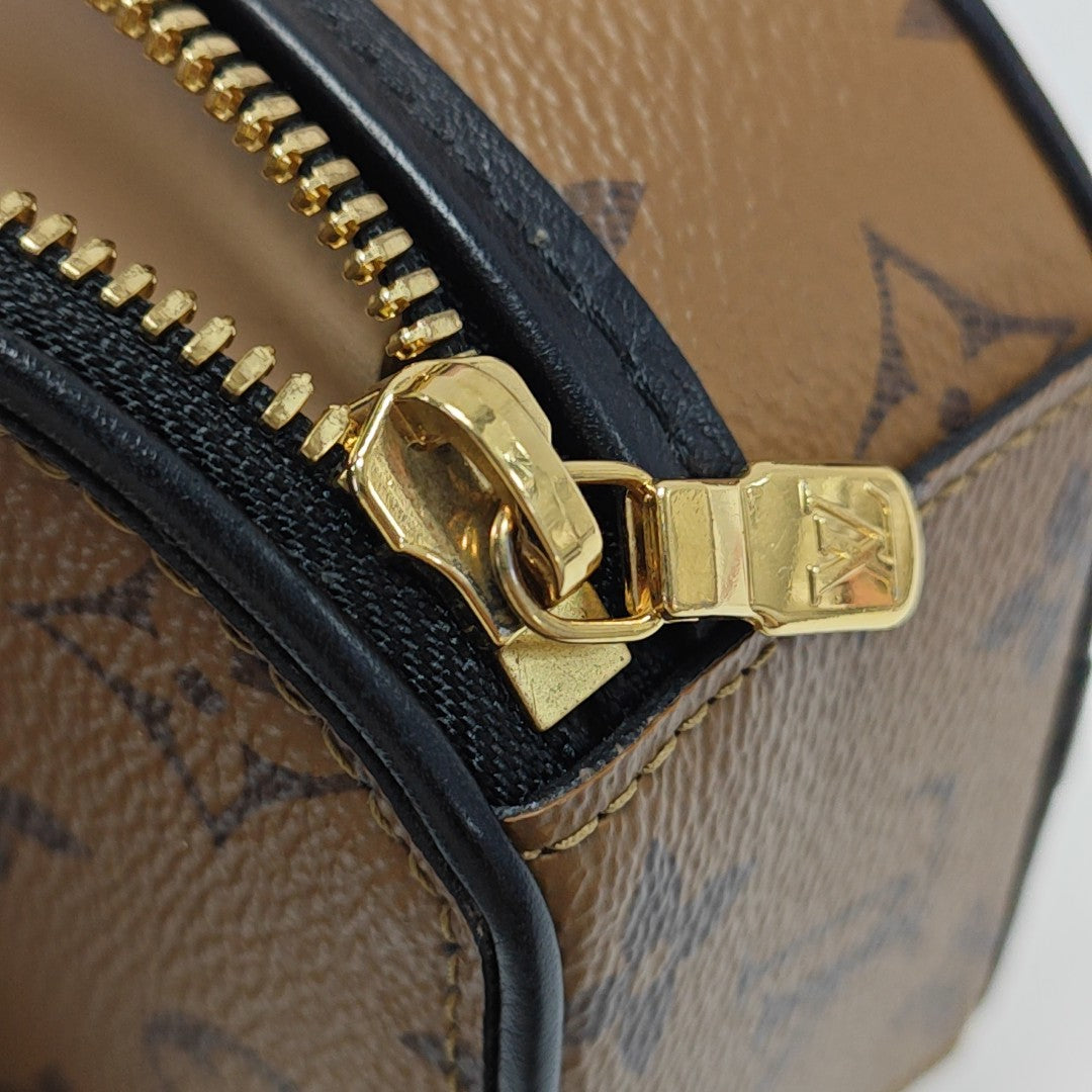 BOITE CHAPEAU Mini Monogram Coated Canvas Brown