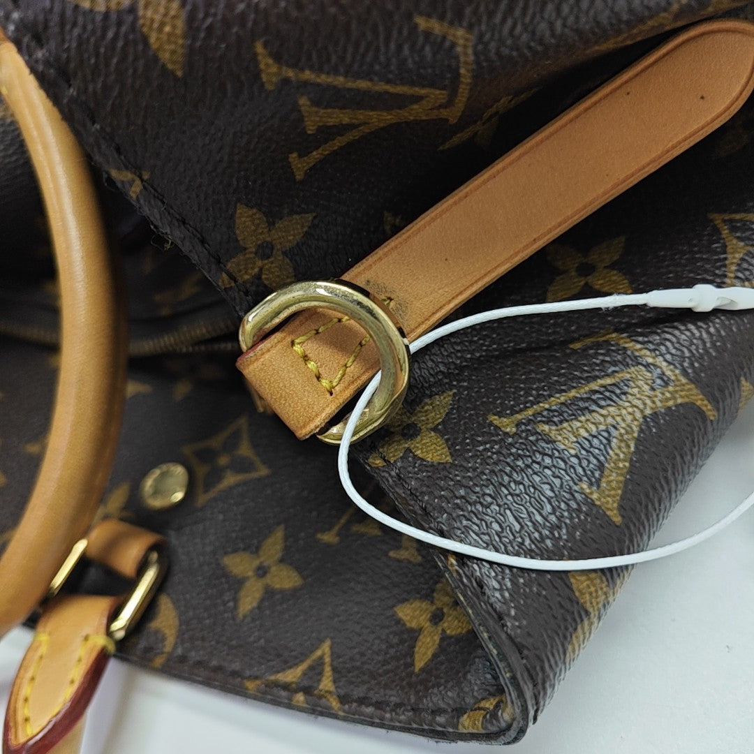 MONTAIGNE Monogram Coated Canvas Brown