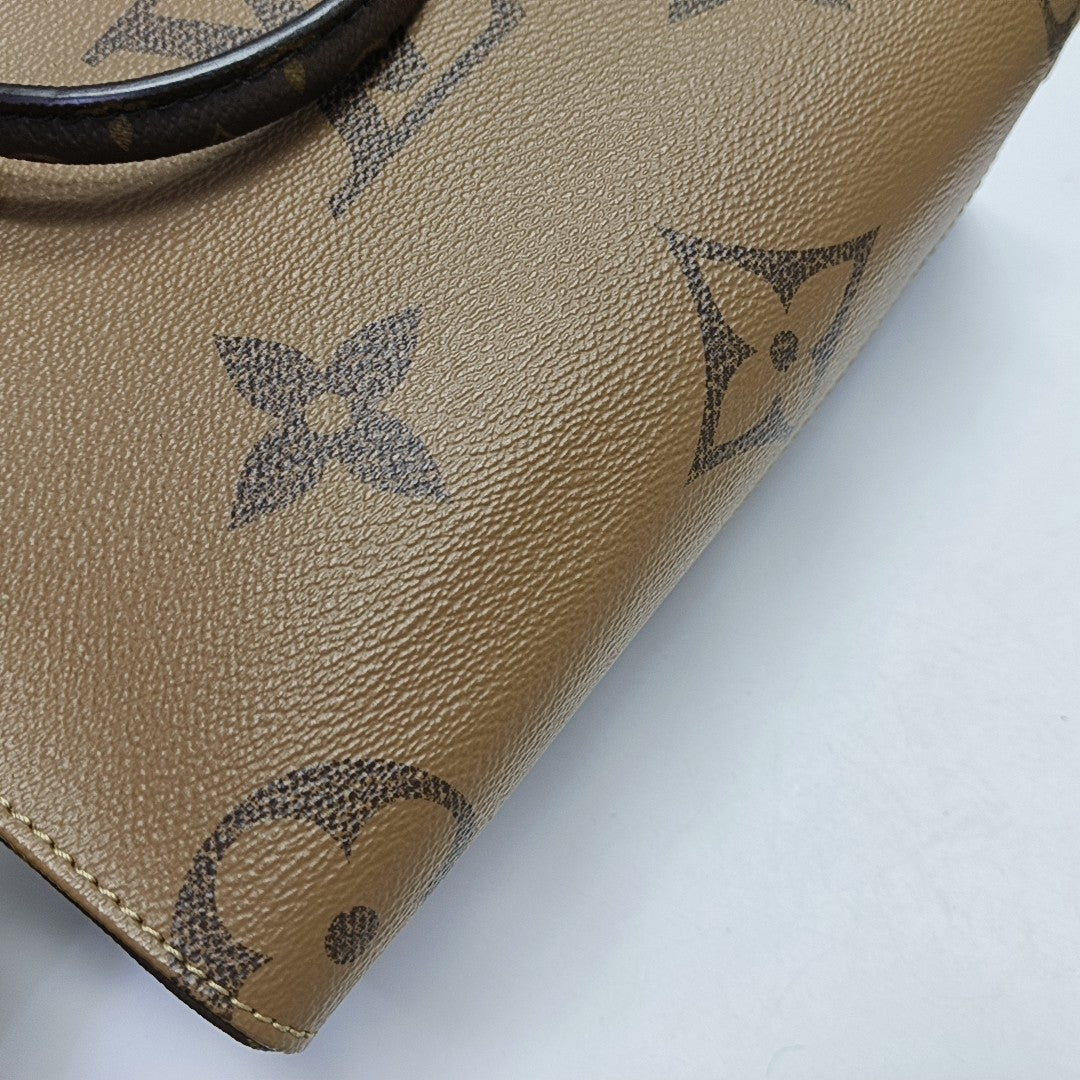 ONTHEGO PM Monogram Coated Canvas Brown