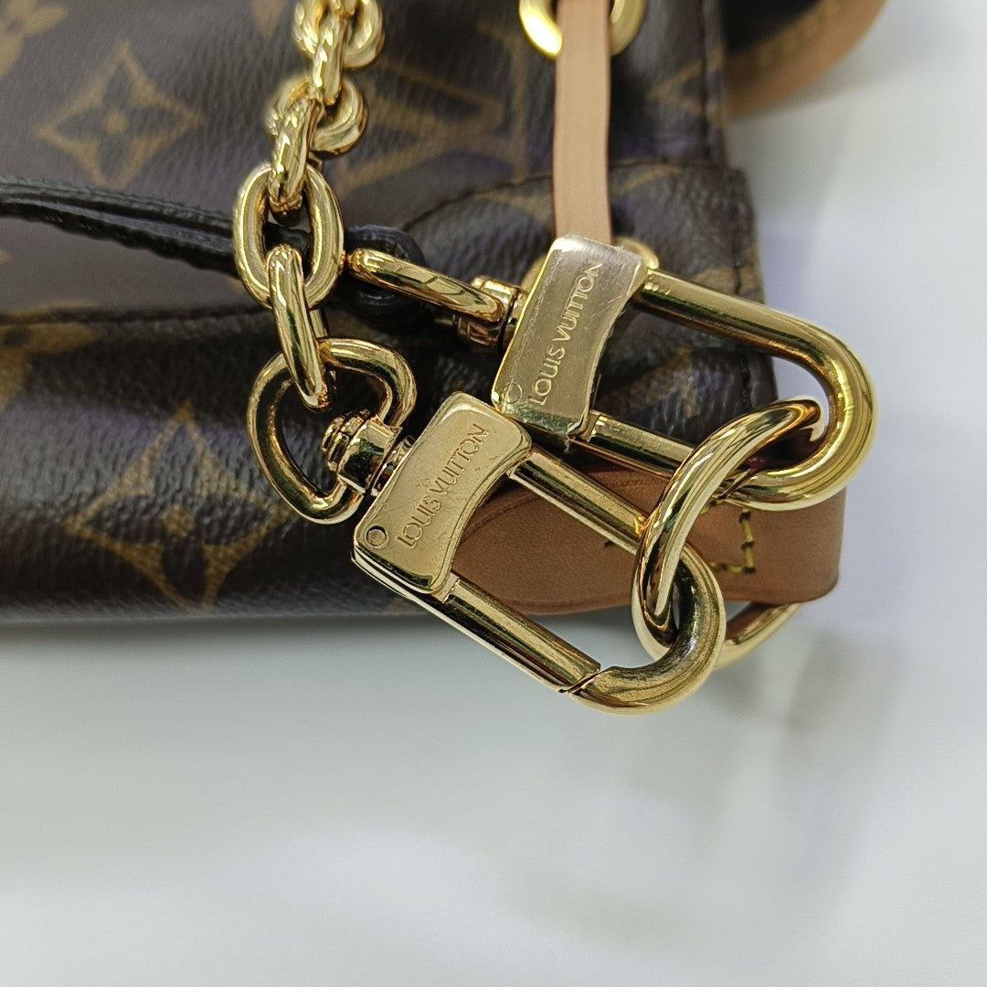 EXCURSION PM Monogram Coated Canvas Brown