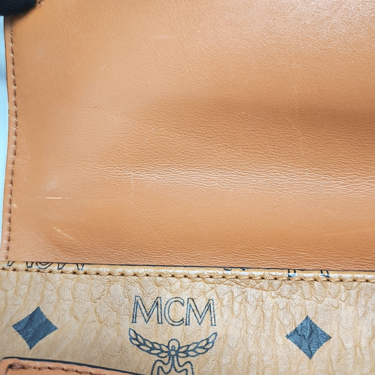 TRACY Small Monogram Coated Canvas Brown