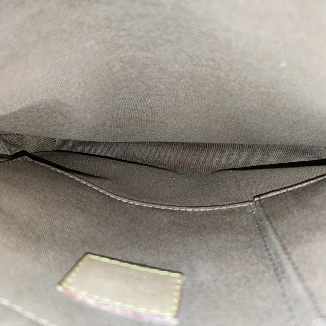ODEON Monogram Coated Canvas Brown