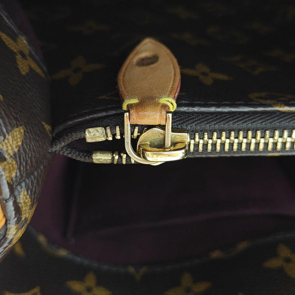 MONTAIGNE GM Monogram Coated Canvas Brown