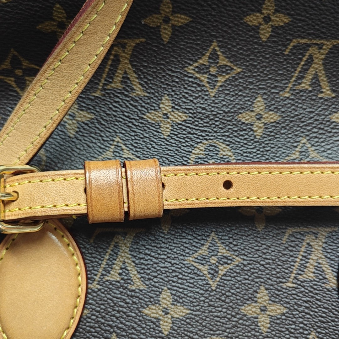 RIVOLI MM Monogram Coated Canvas Brown