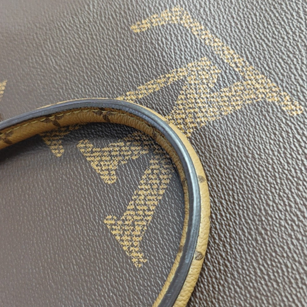 ONTHEGO MM Monogram Coated Canvas Brown