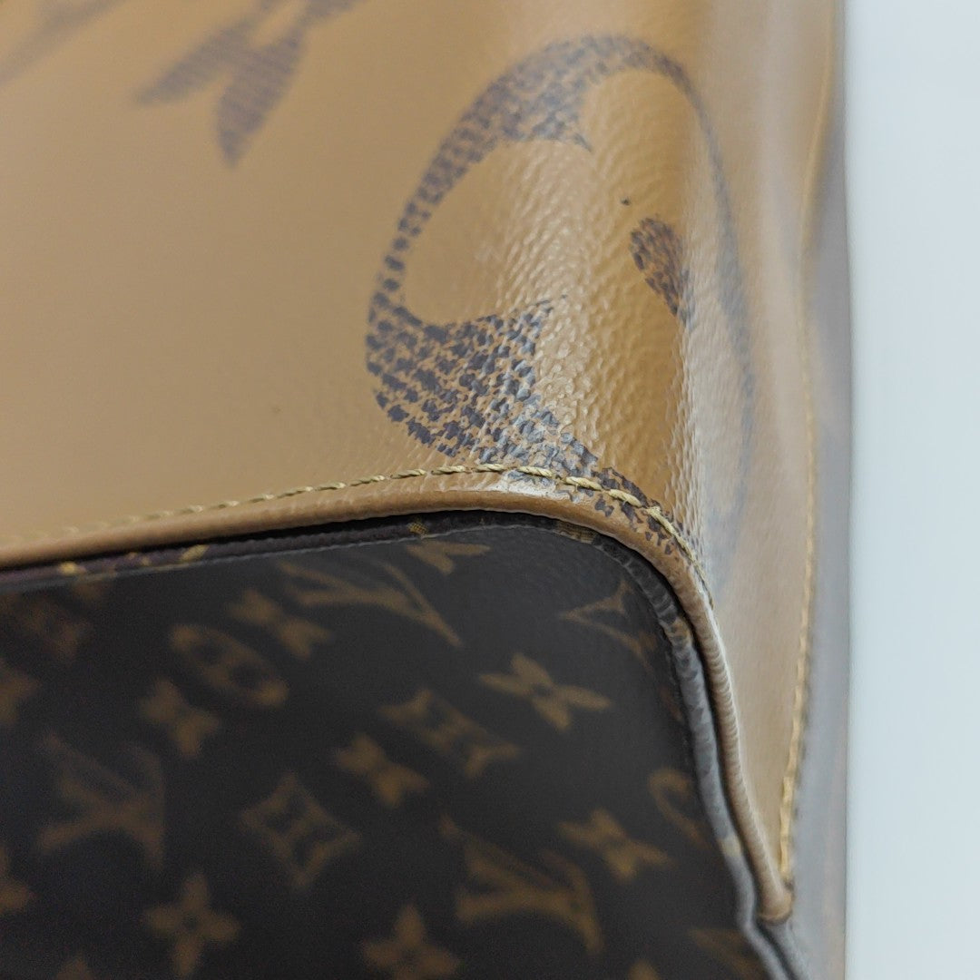 ONTHEGO MM Monogram Coated Canvas Brown